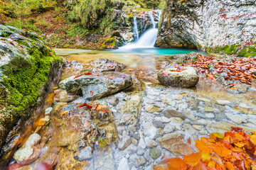 Autumn. Explosion of colors on the waterfalls and streams of the Val d'Arzino.