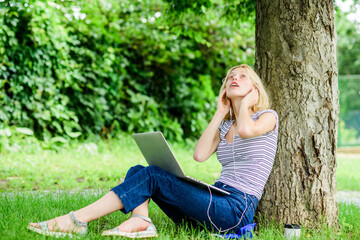Work in summer park. Reasons why you should take your work outside. Nature is essential to wellbeing and ability to be productive and high functioning at work. Girl work with laptop in park