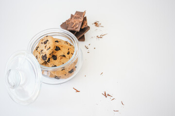 Closeup of chocolate cookies in the glass jar.
