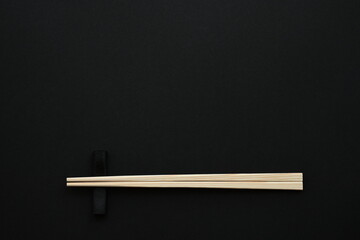 Chopsticks isolated on black background.