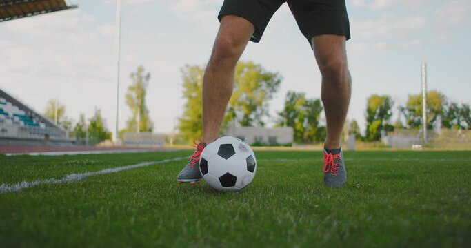 soccer player show footwork and Soccer player kicking and Shooting ball on goal in slow motion