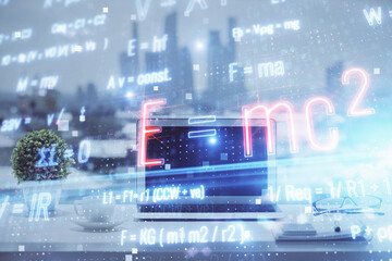 Desktop computer background and formula hologram writing. Double exposure. Education concept.