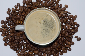 Cup of Coffee with Coffee Beans.