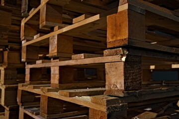 Wooden pallets stacked on top of each other. Close-up