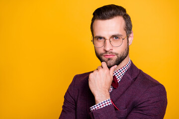 Fototapeta na wymiar Closeup photo of handsome rich clothes stylish guy boyfriend business man well-dressed hand on chin minded wear specs tie bow plaid shirt blazer isolated yellow vibrant color background