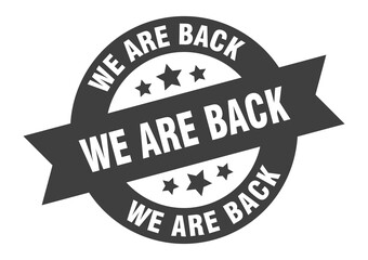 Obraz premium we are back sign. round ribbon sticker. isolated tag