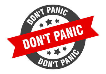 Obraz premium don't panic sign. round ribbon sticker. isolated tag