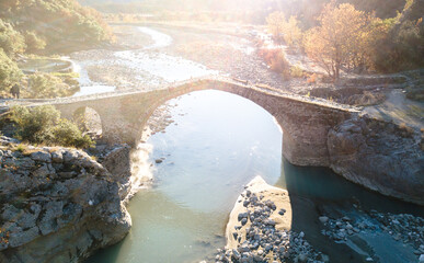 river in the winter bridge sunset old architecture ancient time past future saftey