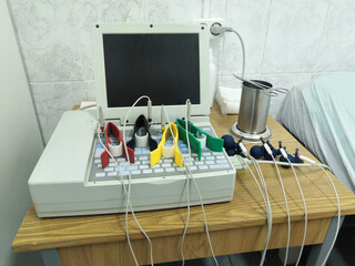 Fototapeta na wymiar Fragment of an ultrasound machine. Color ECG sensors.
