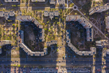 Top view architectural background  texture, style, concept, creative aerial view. Kiev (Kyiv) Ukraine outskirt Troieshchyna three identical panel houses. Horizontal composition. Drone photo