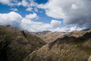 Clouds over wide mountain landscape