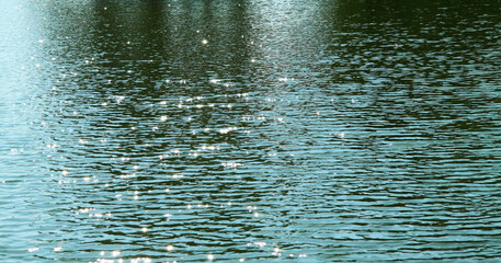 Water surface with ripples on the lake.  For wallpaper, posters and backgrounds