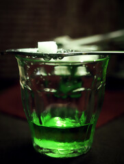 the process of making absinthe according to the old recipe close up	
