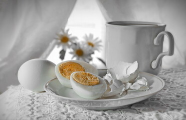 Boiled eggs for breakfast. White still life.