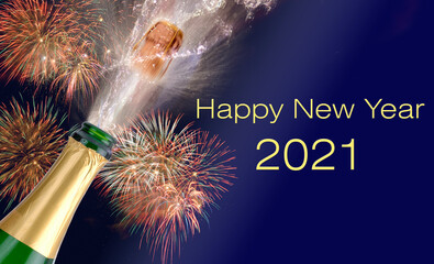 popping bottle of champagne with firework at silvester 2021