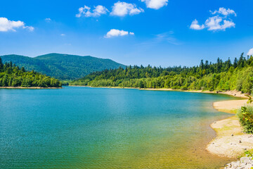 Fototapeta na wymiar Beautiful nature in Croatia, lake Lepenica in Gorski kotar, green forest and mountains in background