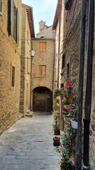 Fototapeta na wymiar Vintage alleys of Cortona, a town that was an Etruscan lucumonia in Tuscany, Italy.