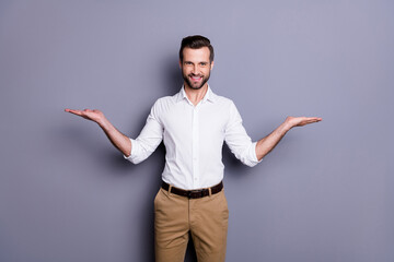Portrait of positive cheerful man real estate agent economist chief hold hand recommend choose...