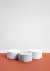 concrete podium on earthy tone background. Pedestal, place for product