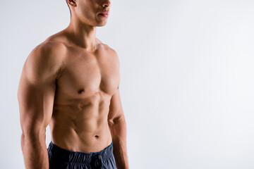 Cropped view portrait of his he nice attractive powerful strong content tanned guy ripped shape...