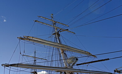 Fototapeta premium Rigging of a large wooden tall ship, mast and booms.