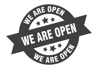 we are open sign. round ribbon sticker. isolated tag