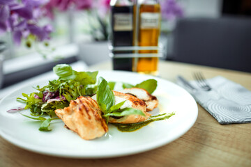 grilled chicken breast and salad
