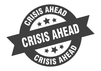 crisis ahead sign. round ribbon sticker. isolated tag