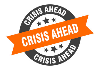 Fototapeta premium crisis ahead sign. round ribbon sticker. isolated tag