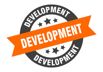 Fototapeta premium development sign. round ribbon sticker. isolated tag