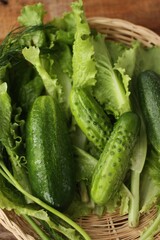 Cucumbers lettuce and dill on the table macro