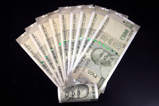 Indian currency. 500 rupee note. Five hundred rupee Indian currency isolated on black background.