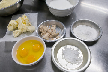 baking ingredients eggs, flour, sugar, butter, yeast. dough preparation.