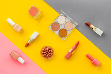 Multicolor pattern of makeup products and colorfull cosmetics. Flat lay top view
