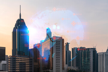 Glowing hologram of Earth planet map on aerial panoramic cityscape of Kuala Lumpur at sunset, Malaysia, Asia. The concept of international business in KL. Multi Exposure.