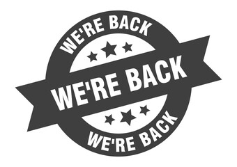 we're back sign. round ribbon sticker. isolated tag