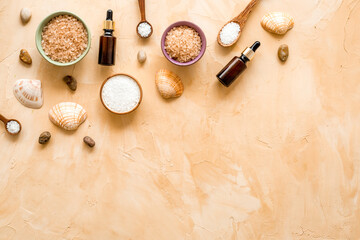 Spa bath salt and sea seashells top view