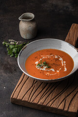 Tomato soup with cream. Copy space