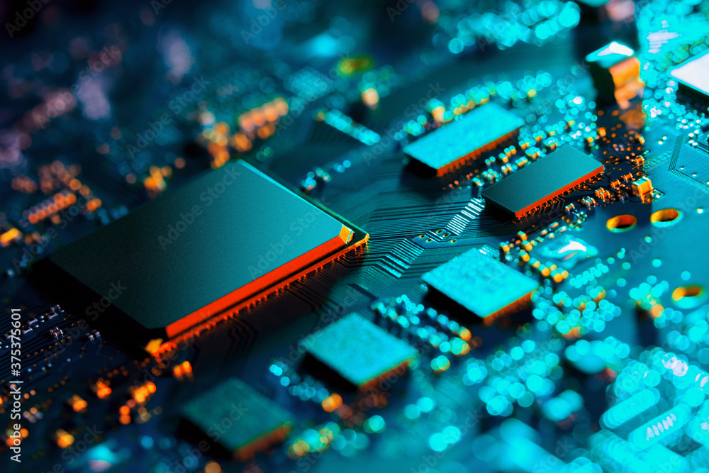 Canvas Prints electronic circuit board with electronic components such as chips close up. blurry background.