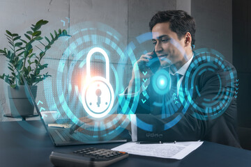 Businessman in office working with laptop, develop data protection system to diminish business risks, typing computer. Double exposure.