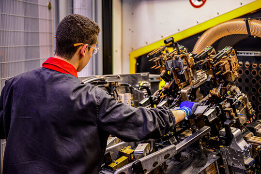 Worker On A Automotive Spare Parts Warehouse