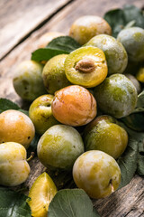 Ripe  yellow  plum fruits harvested in fall as background texture