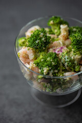 Salad with Shrimps, broccoli , onion and quinoa. Copy space
