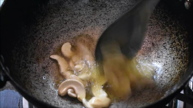 Video of roasting Cashew nuts in Ghee. It is used for making payasam a south Indian dessert.