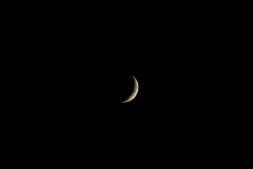 young moon at night