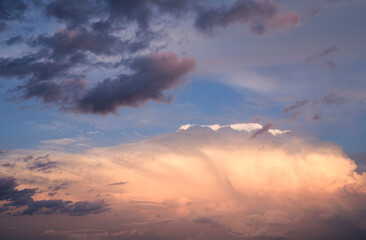 Naklejka na ściany i meble sunset sky with stormy clouds