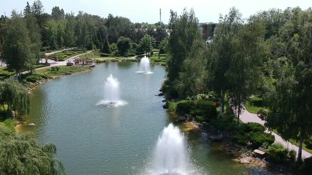 Aerial view, Mezhyhirya residence of the former president of Ukraine Viktor Yanukovych. Beautiful lakes with fountains. Drone
