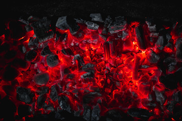 hot red coals among black ash, wallpapers for mobile devices, abstract - obrazy, fototapety, plakaty