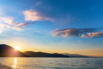 Beautiful sunrise landscape. The Mountains and lake early morning. Sevan National park Armenia.