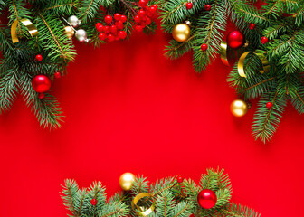 Fototapeta na wymiar Christmas red background with christmas decorations, top view with space for text.